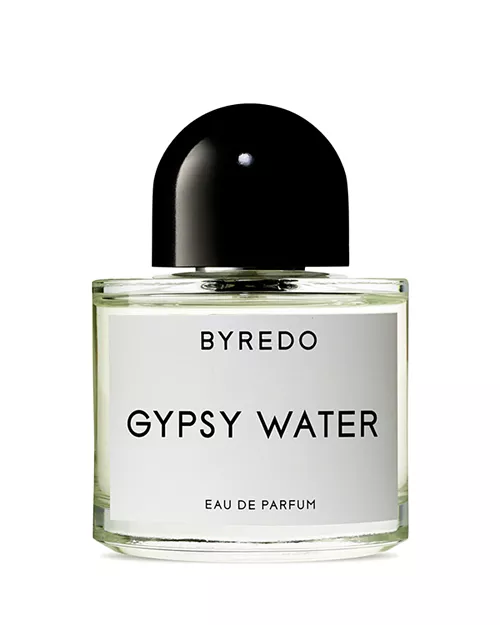 Clear perfume bottle with black writing.