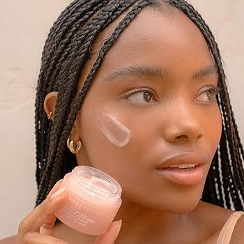 Cream on her face.