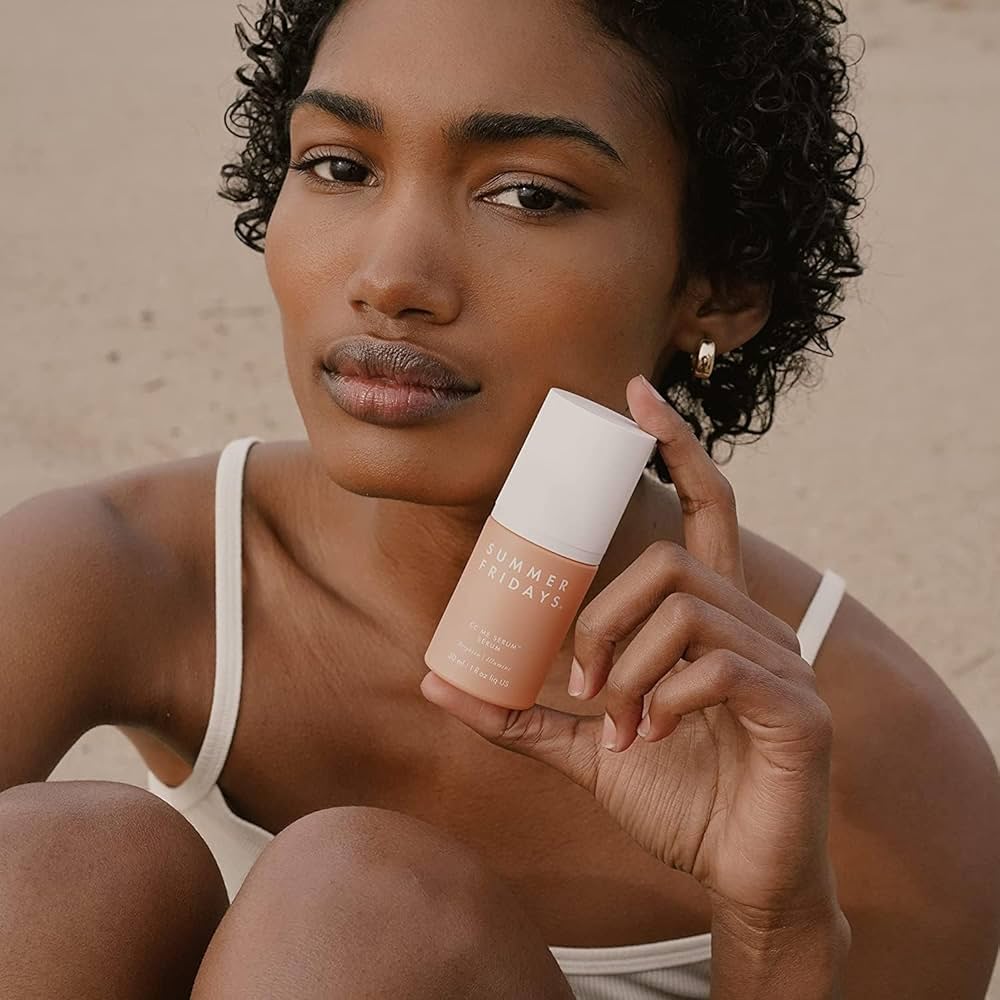 Holding Summer Fridays CC Me Vitamin C Serum.