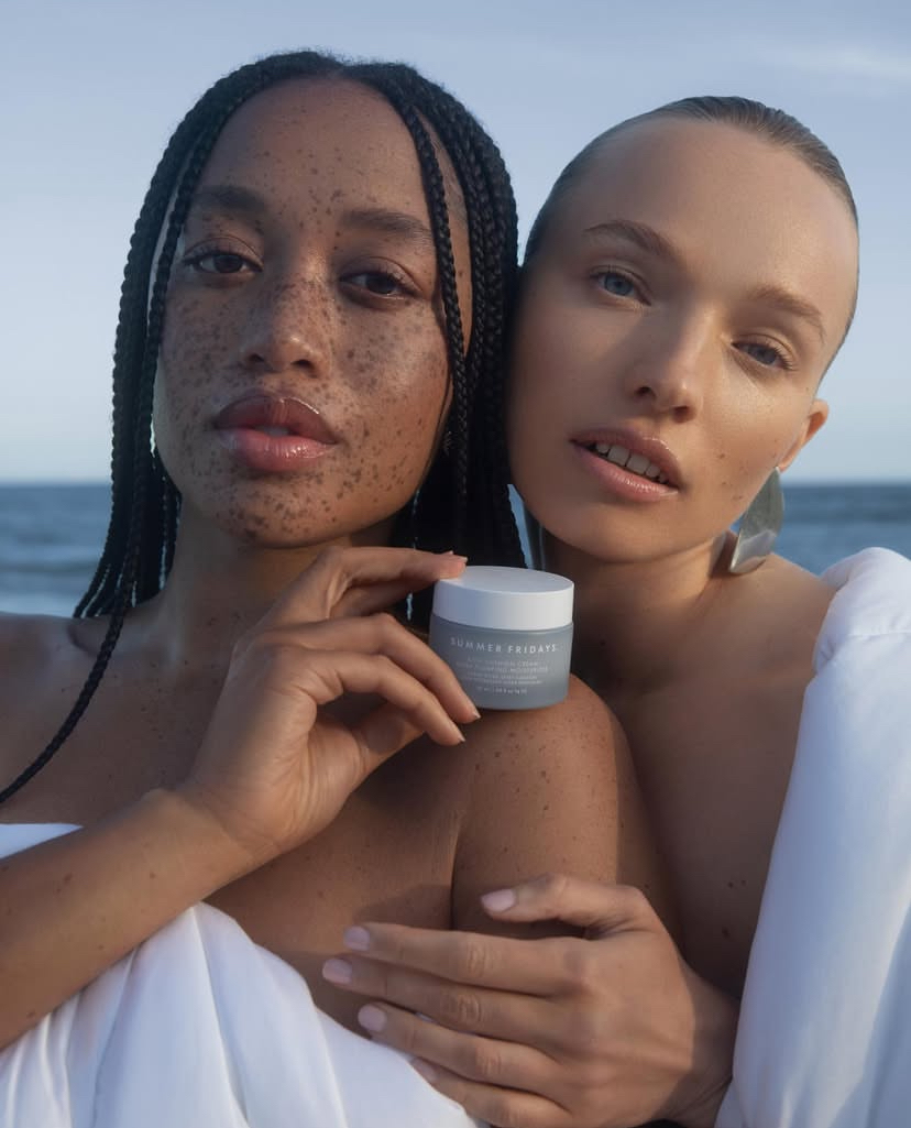 Holding Summer Fridays skincare.