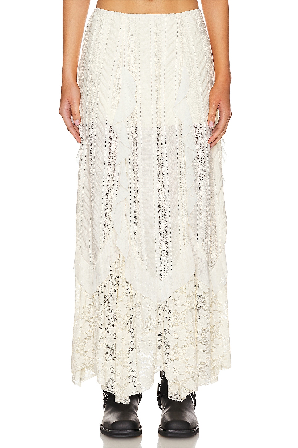 Off white lace maxi skirt on a model.