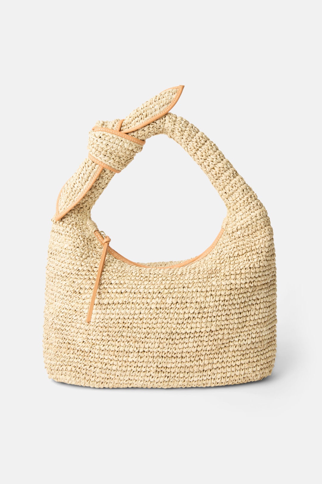 Light tan woven tie handle purse.