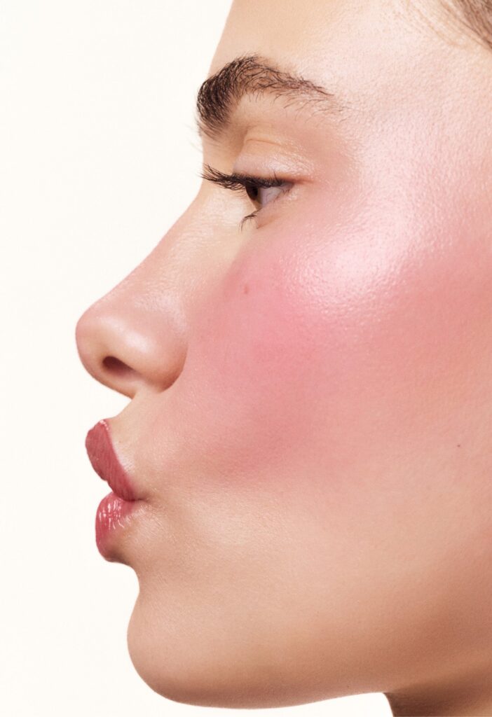 Rhode Date Cake Pocket Blush applied to face, which is step four of a summer glow-up
