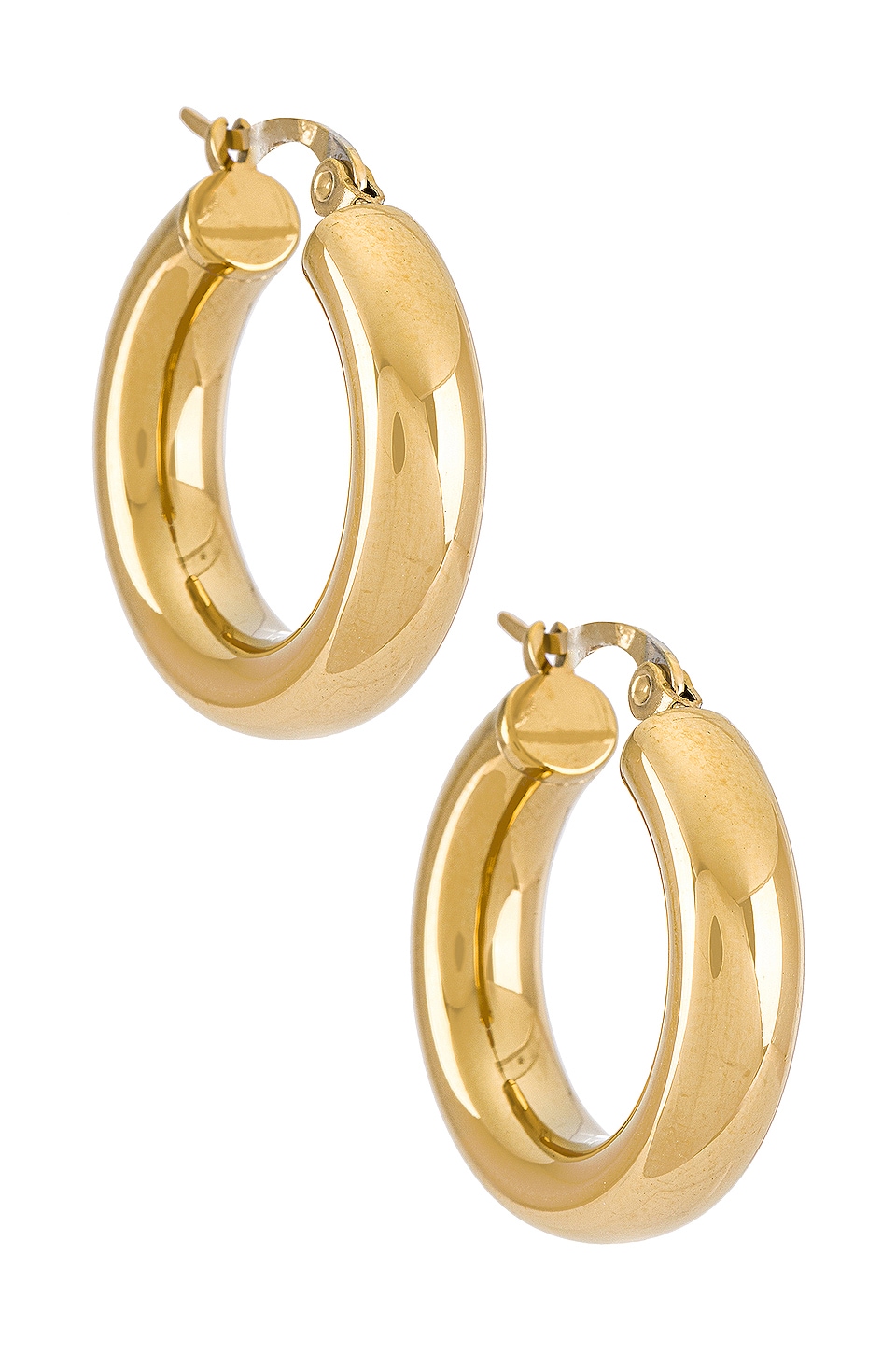 Thick gold hoop earrings.