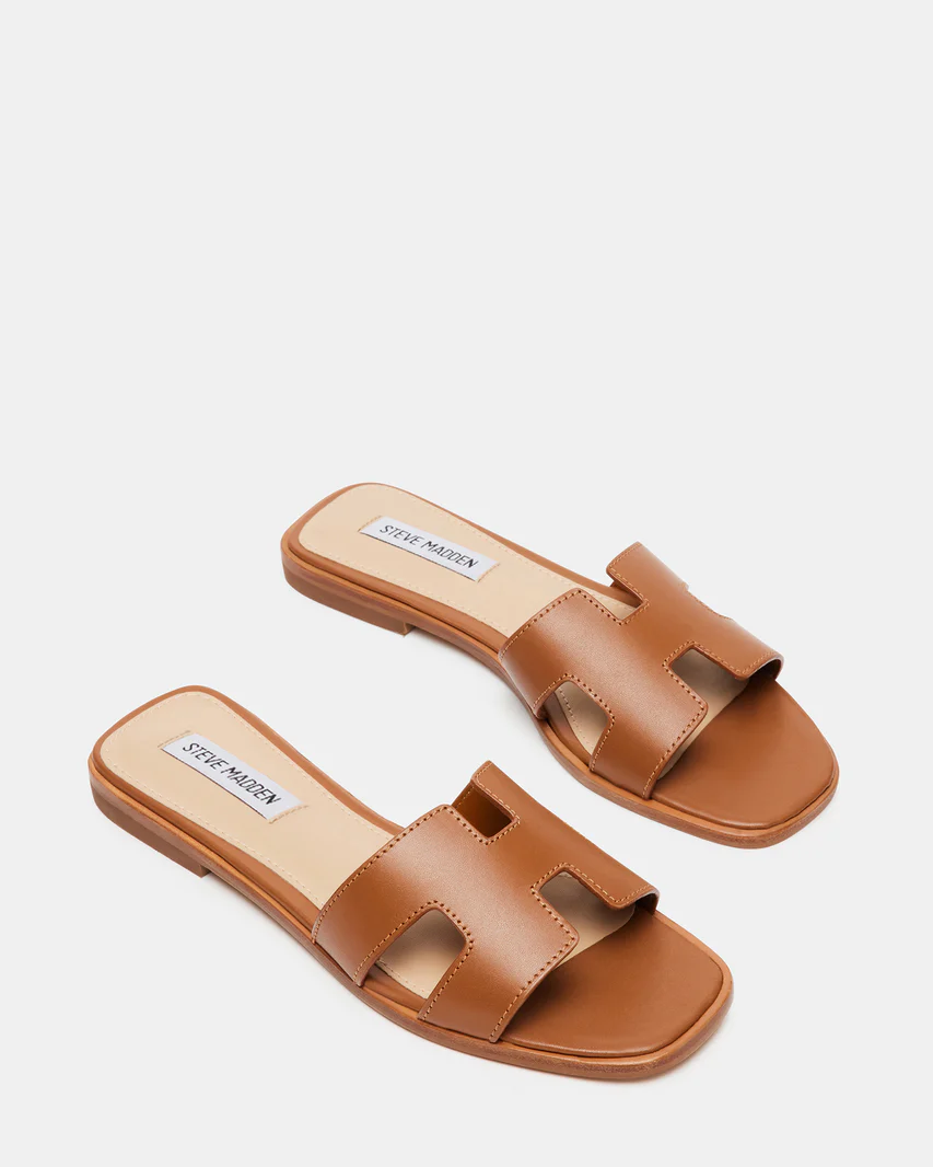Cognac leather cut-out slides.