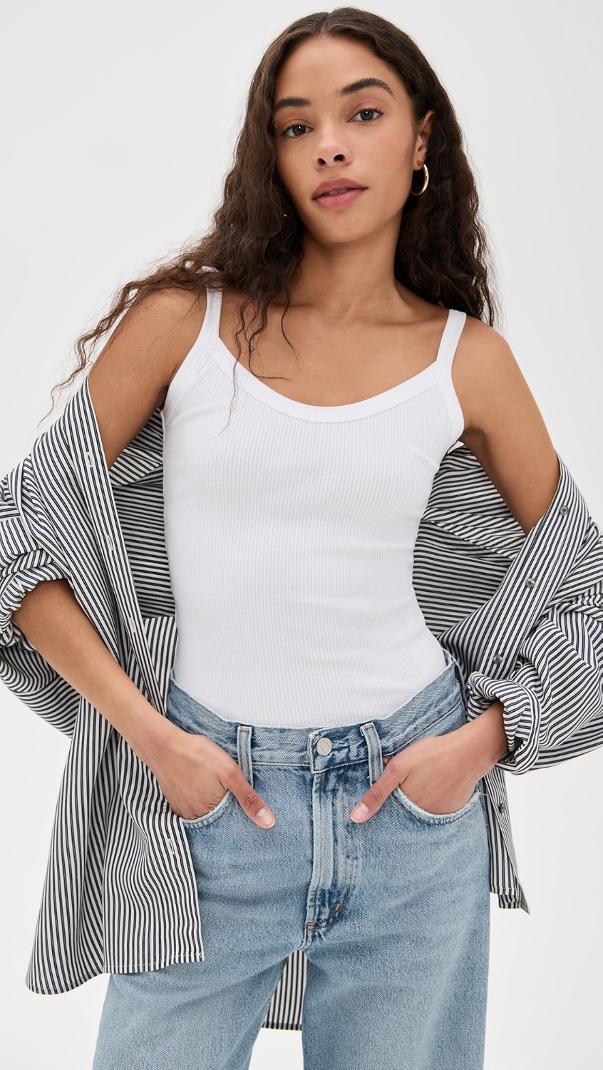 White thin-strapped tank top on a model.