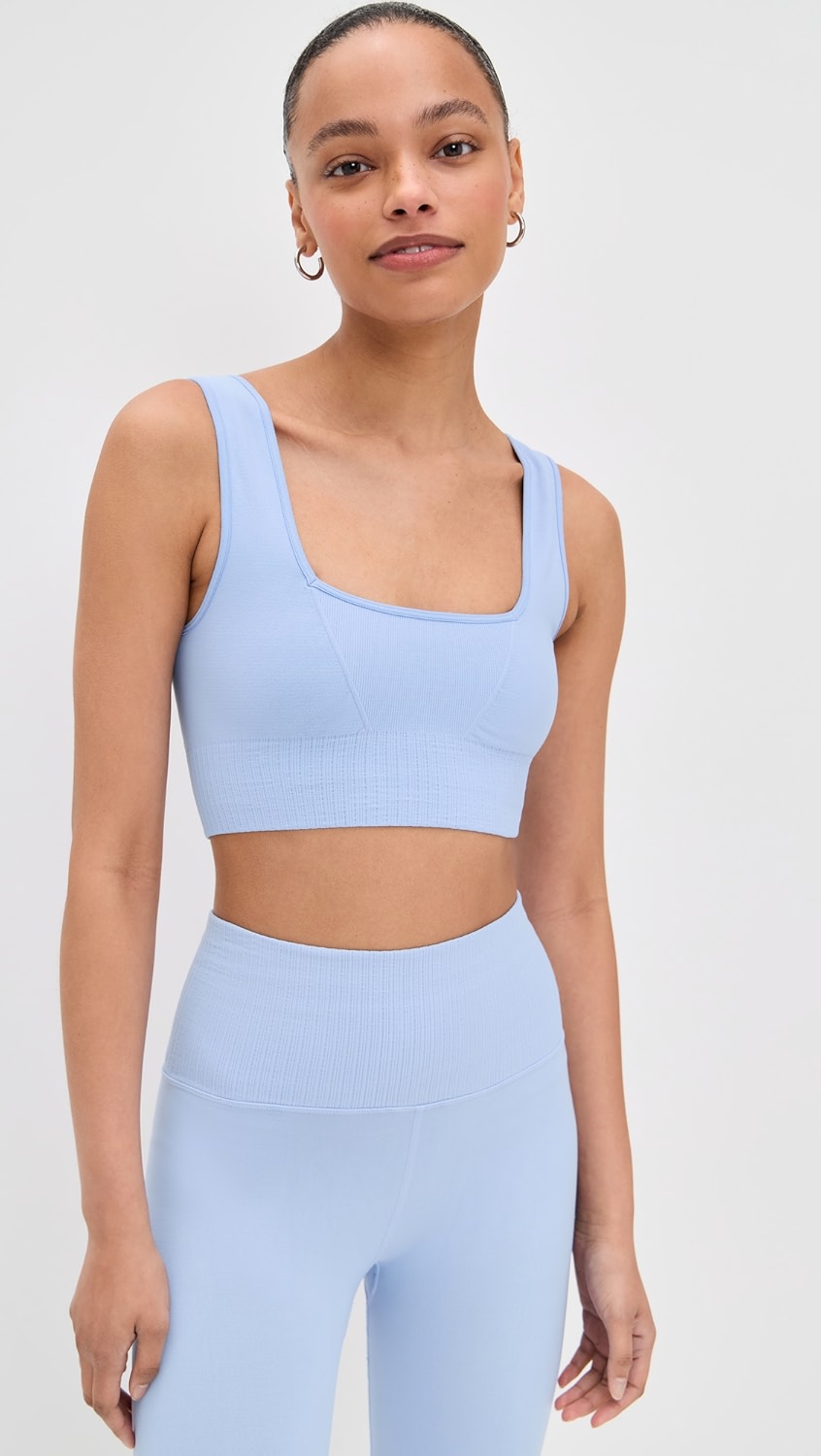 Light blue sports bra on a model.