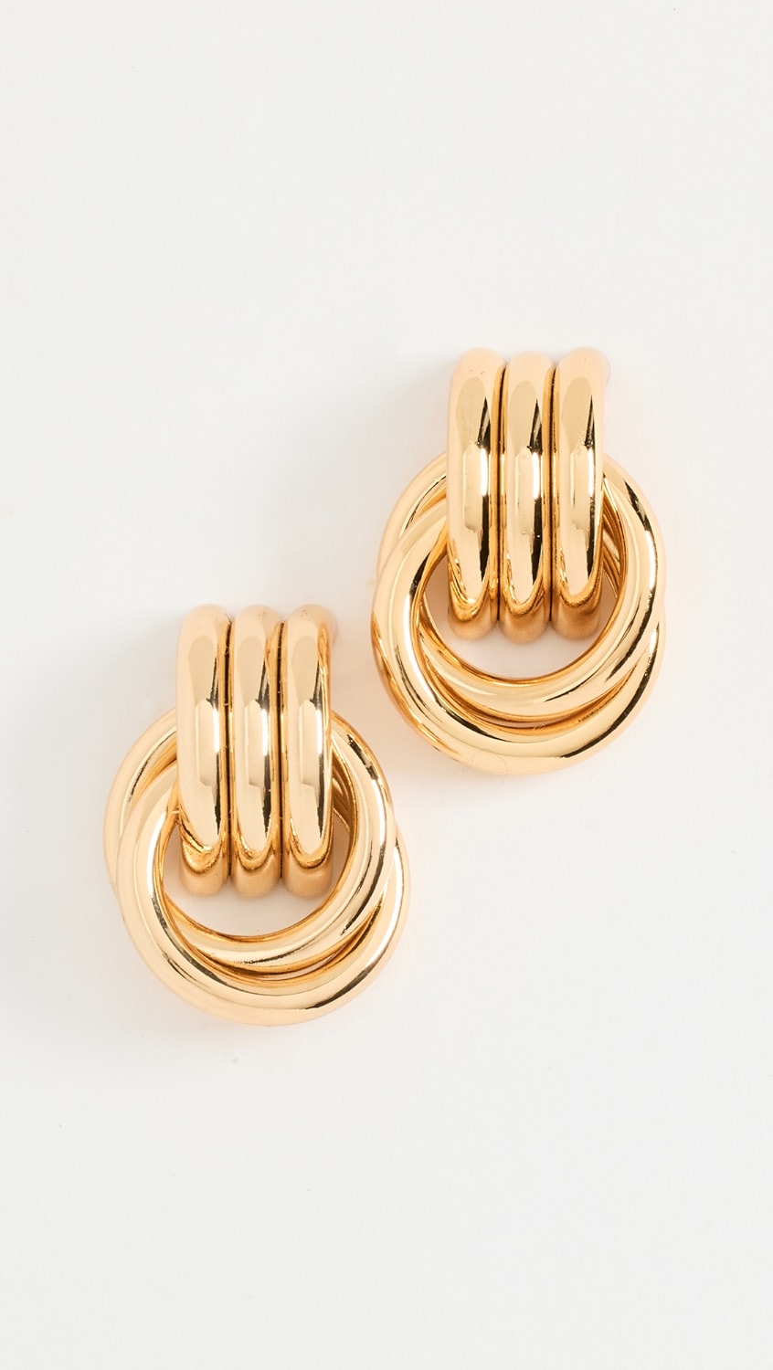 Gold chunky layered hoop earrings.