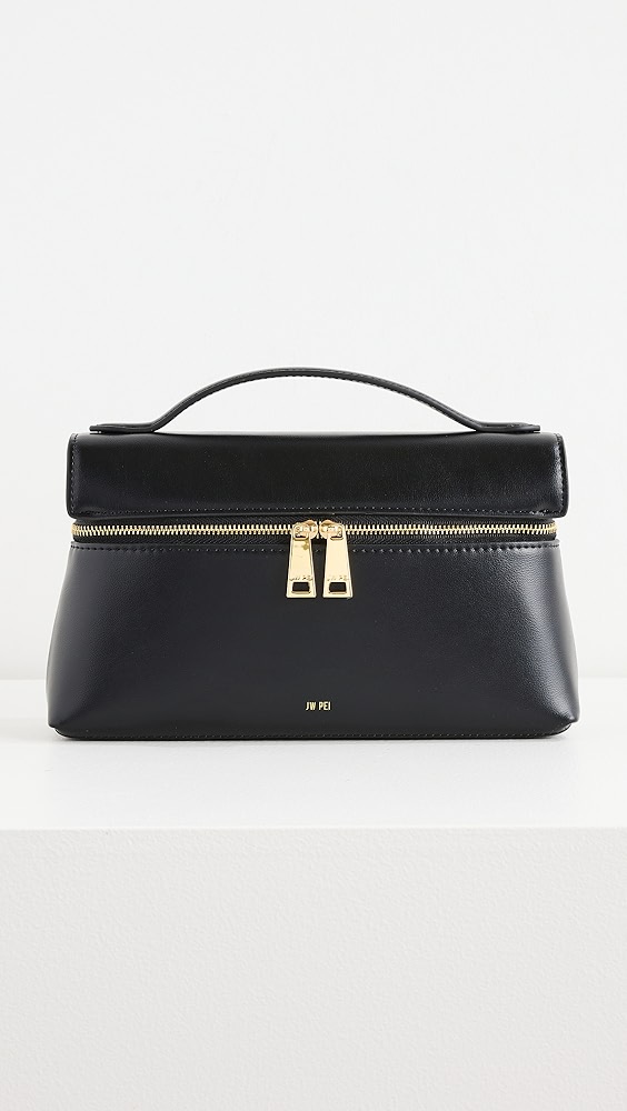 Black leather top handle bag with gold details, which is one of the night out essentials.