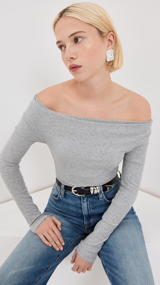 Gray off the shoulder top on a model.
