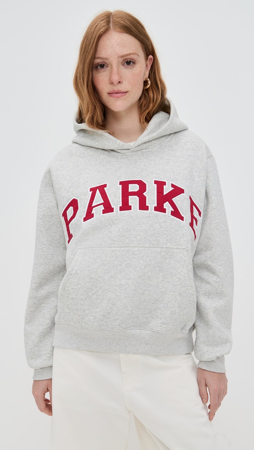 Gray hoodie with red "PARKE" text across the chest on a model.