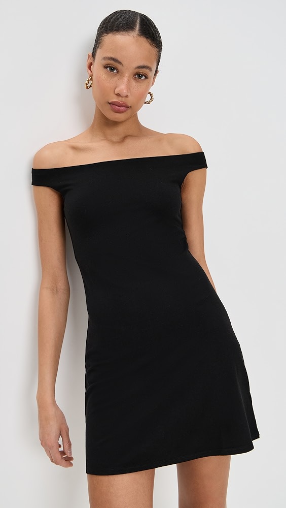 Black off the shoulder knit dress.