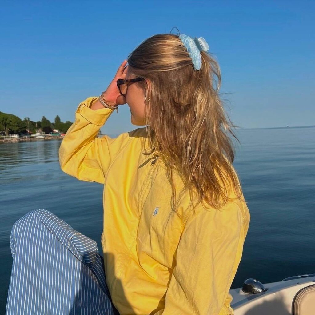 Wearing a blue pearl finish Emi Jay hair clip