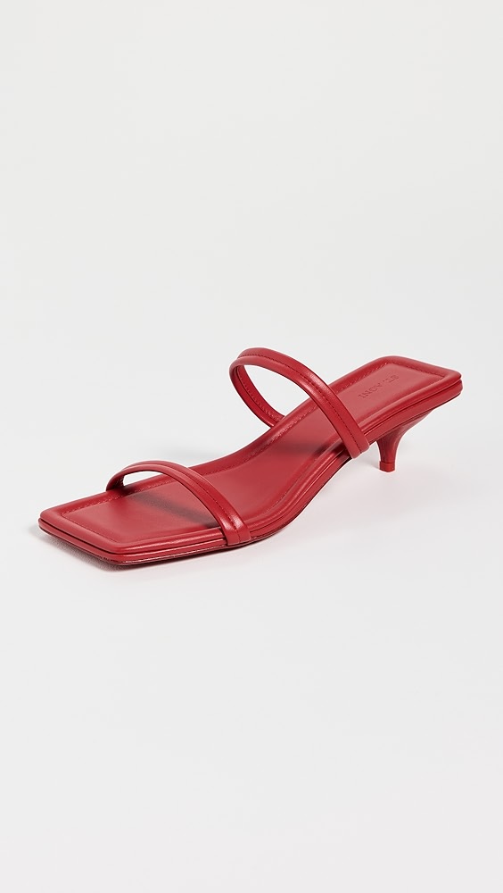 Red scrappy kitten heels.