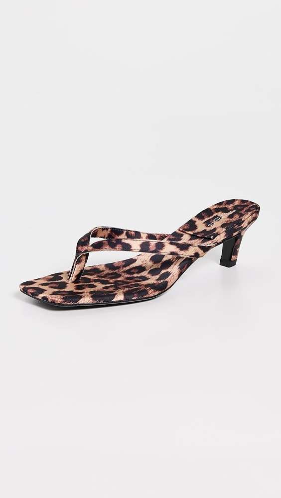 Cheetah sandal heels, which is one of the night out essentials.