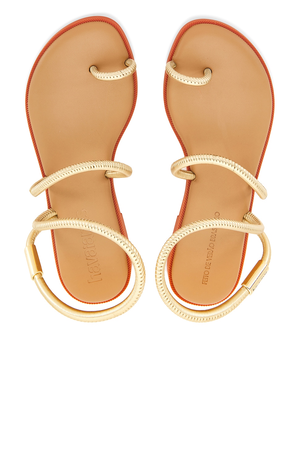 Gold shiny sandals.