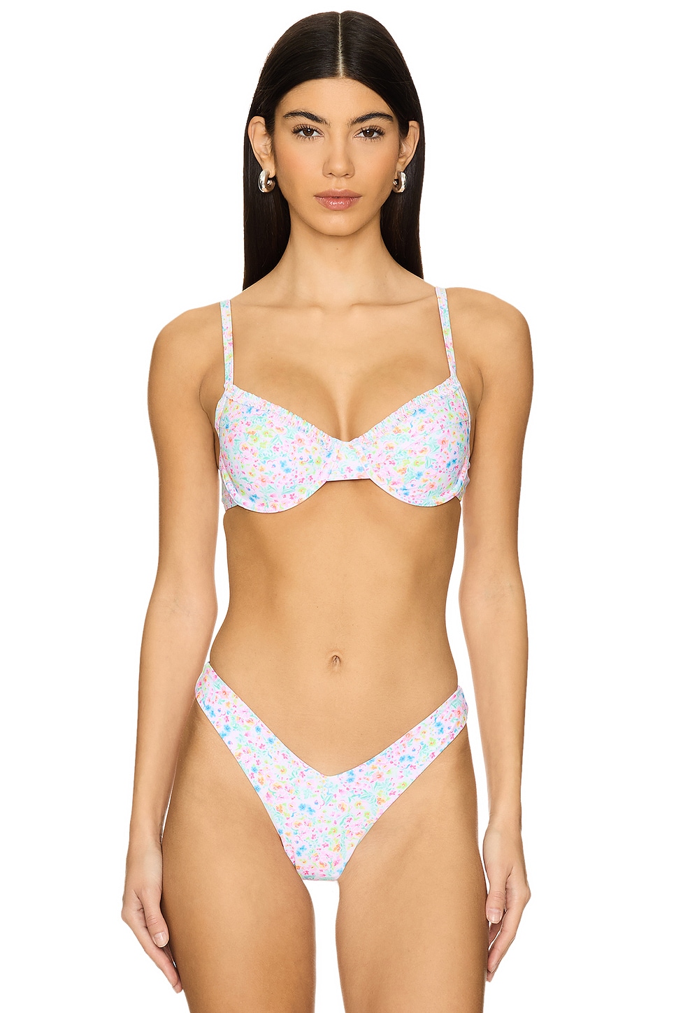 Multicolored and white floral underwire bikini on a model.