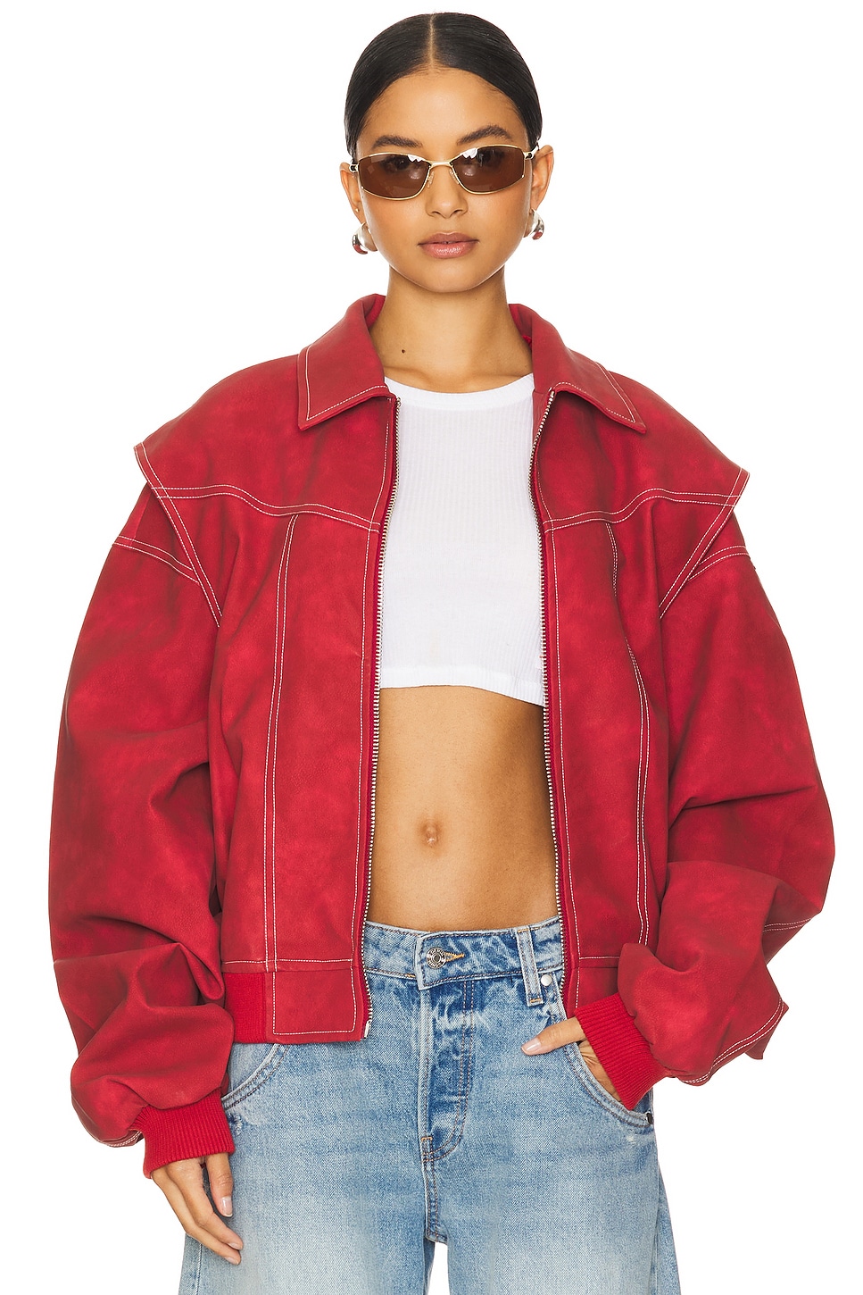 Bright red leather bomber jacket on a model.