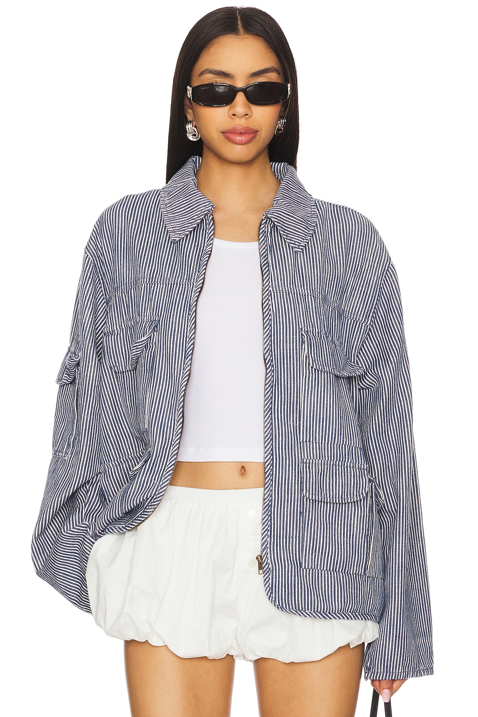 Navy and white striped utility shacket on a model.