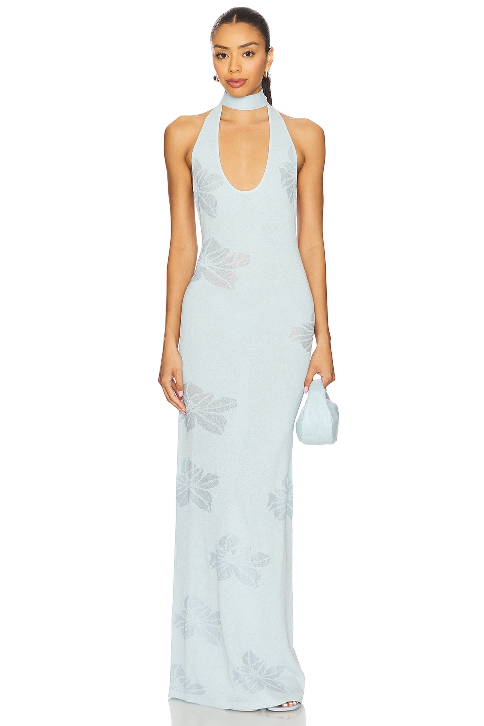 Deep neckline floral light blue knit maxi dress on a model.