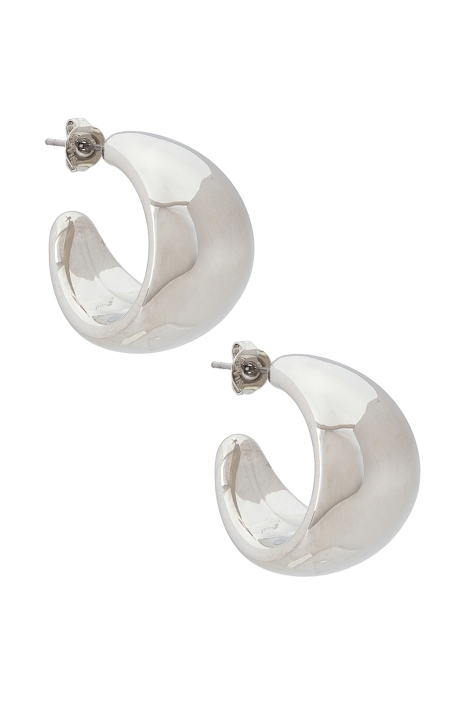 Small chunky silver hoop earringsl, which goes along with college clothing.