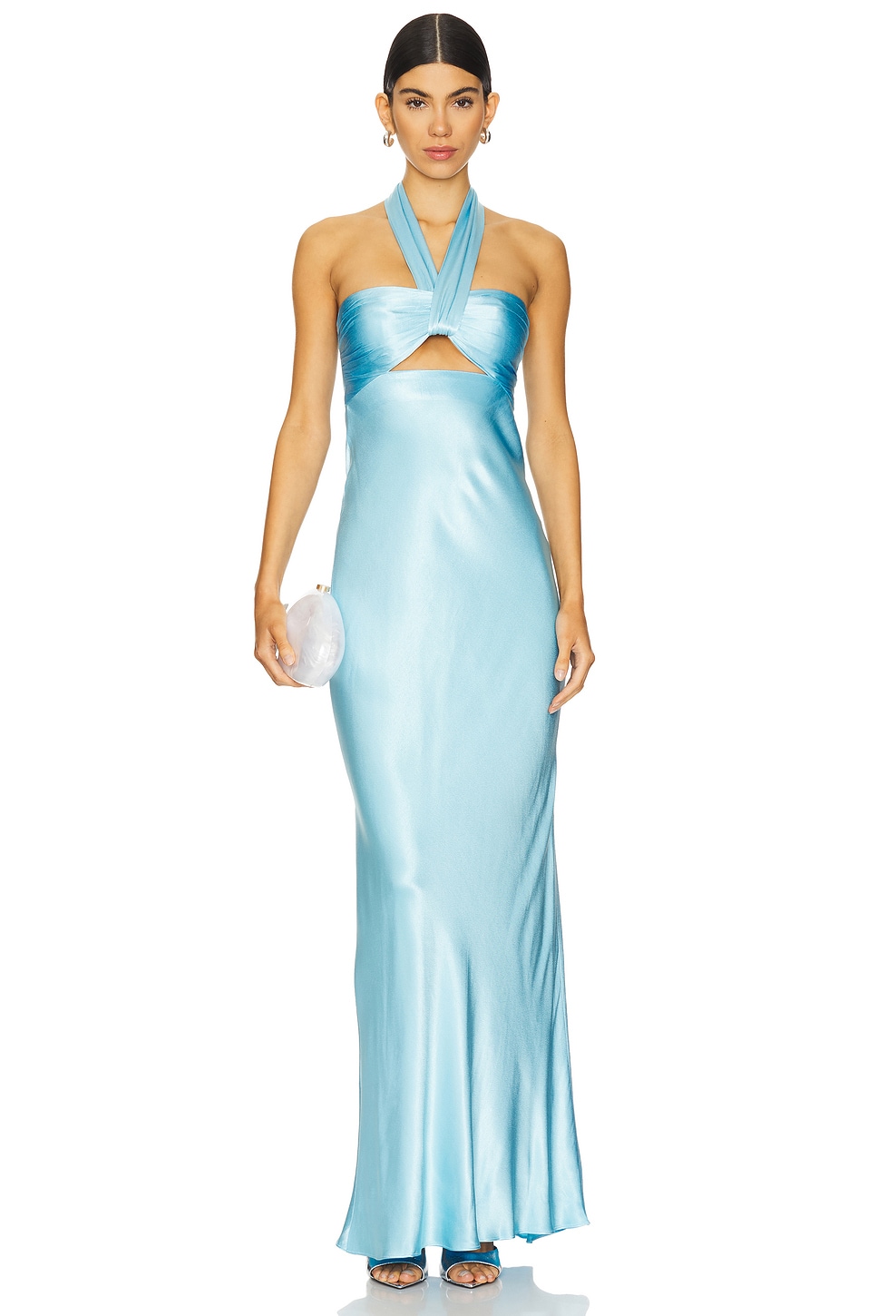 Bright blue silky halter dress with a cutout on a model, which is one of the wedding guest dresses.