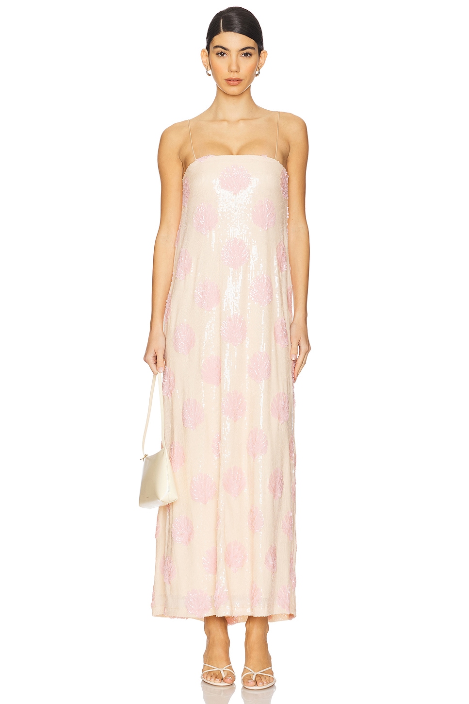 Pink polka dot sequin midi dress on a model.