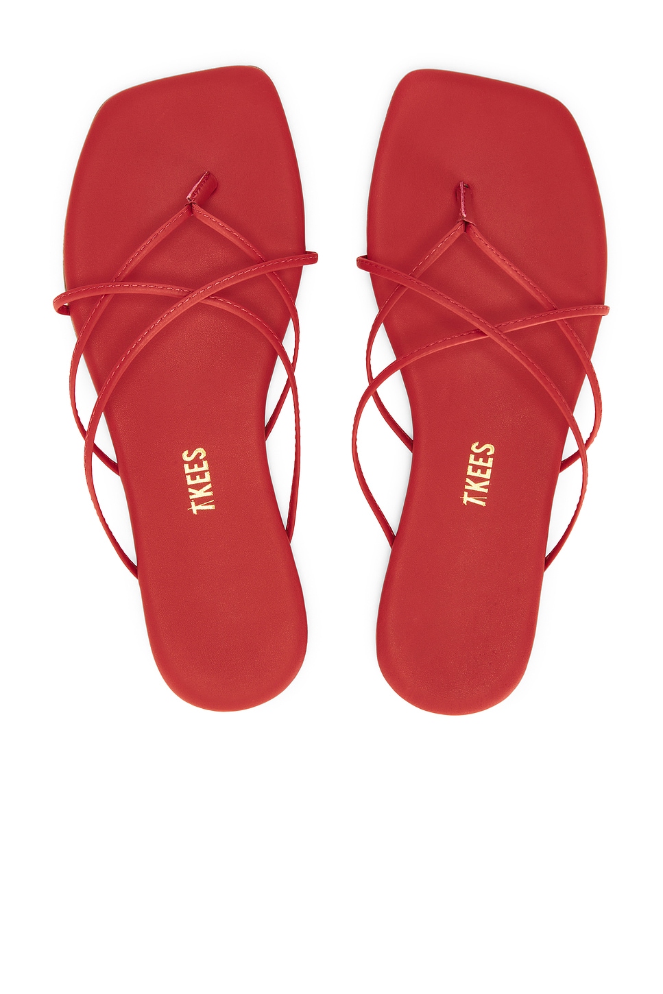 Red strappy sandals.