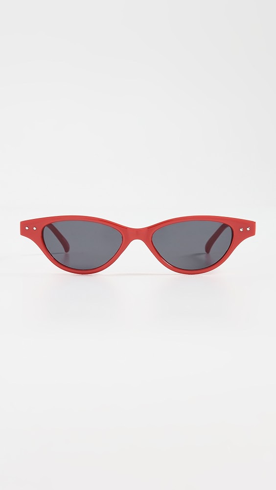 Red sunglasses with dark gray lenses, which is one of the 4th of July fashion finds.