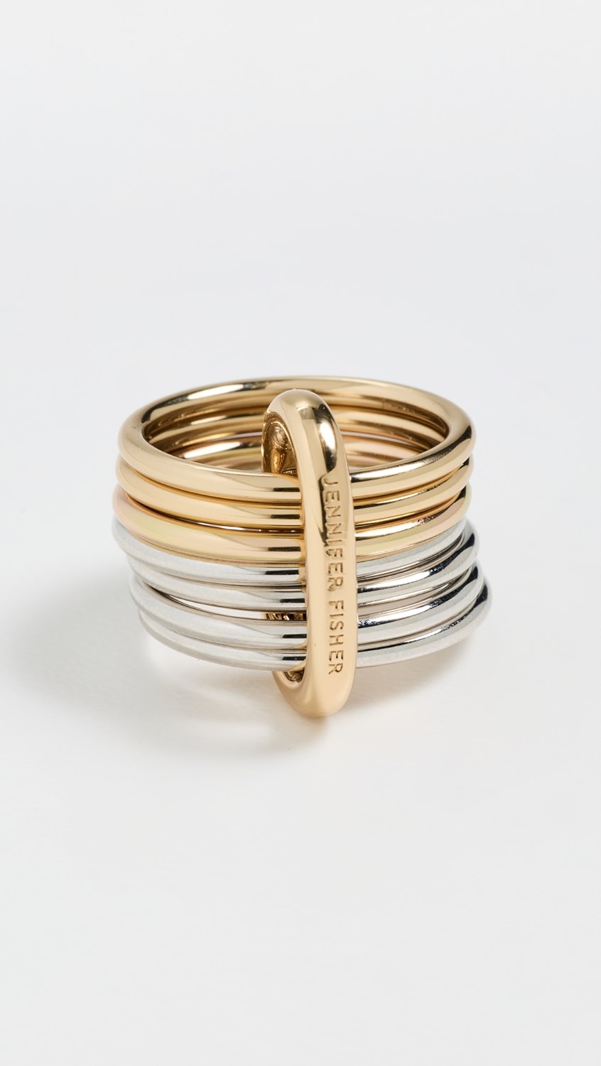 Gold and silver stacked rings attached with a carabiner.