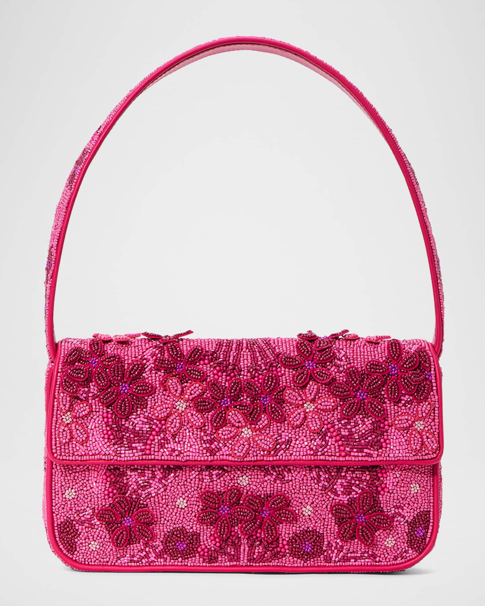 Pink beaded purse with magenta and pink flower designs.