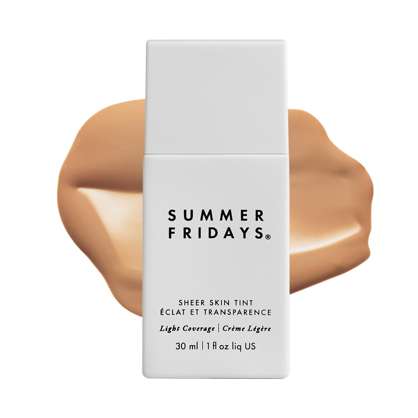 White Summer Fridays bottle with a swatch of tan skin tint, which is one of the summer beauty products.