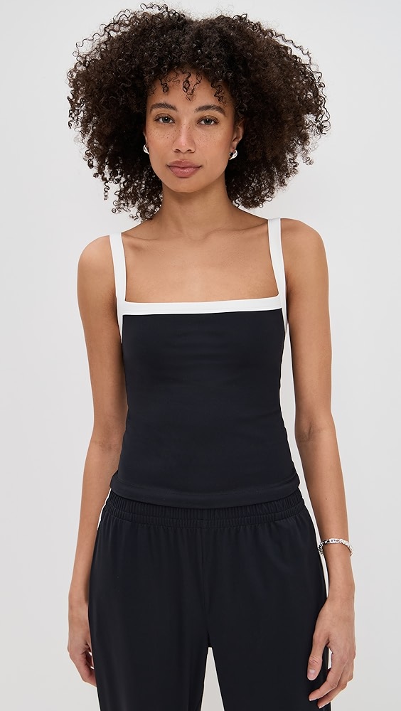 Black active tank with a white outline on a model.