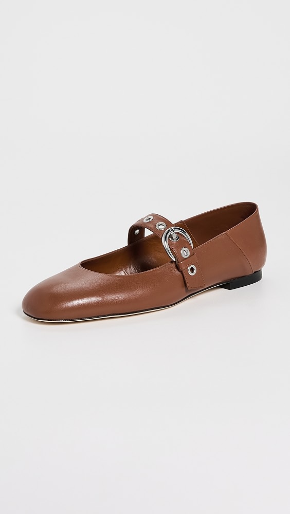 Brown leather shoe with a strap.