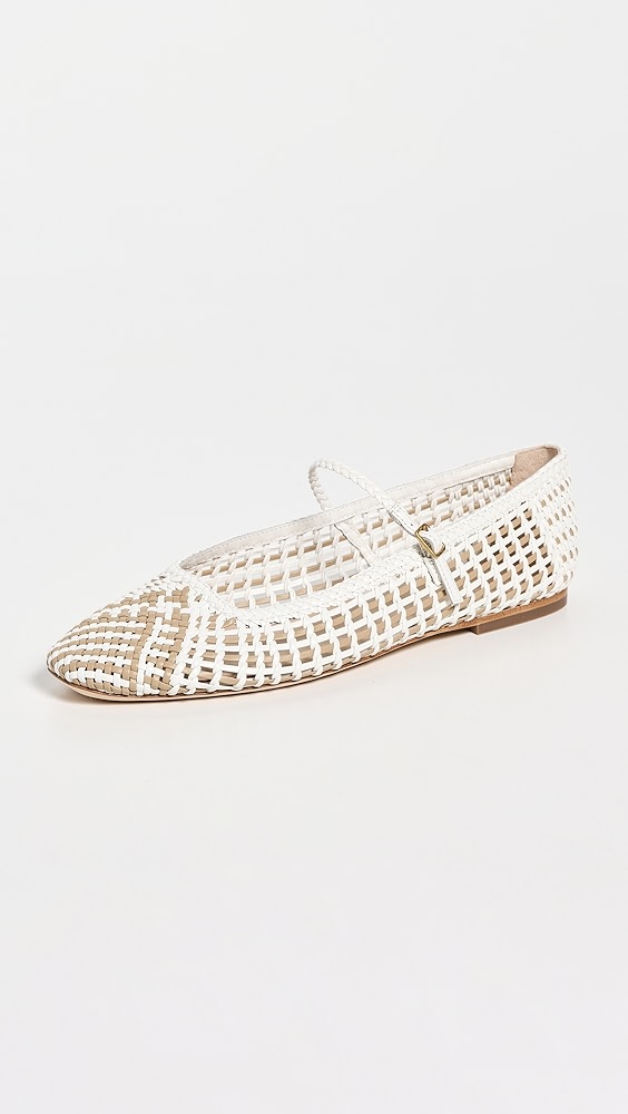 White woven ballet flats with a strap.