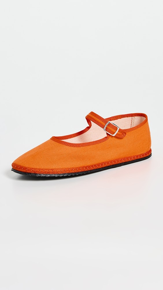 Bright orange and dark orange two-tone shoe with a strap.